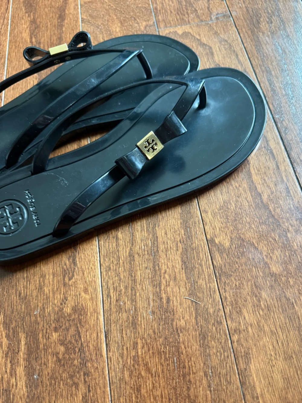 Tory Burch Black Jelly Bow Flip Flops with Gold Logo Accent - Picture 3 of 10